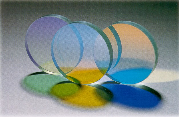 Three interference filters showing different transmitted and reflected colors